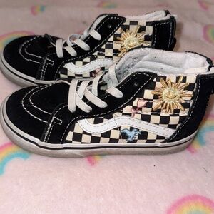 Black and White Checkered High-Top Vans Sneakers